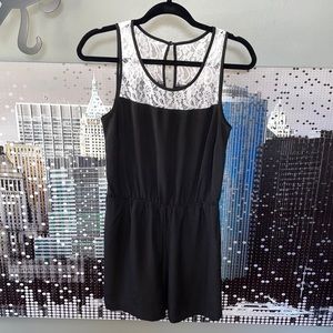 3 for $20//NWOT black romper with pockets and white lace